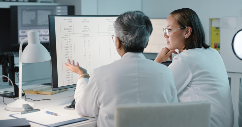 Medical staff discussing data